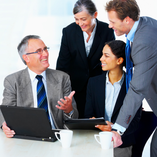 Group of Real Estate agents talking about CMA